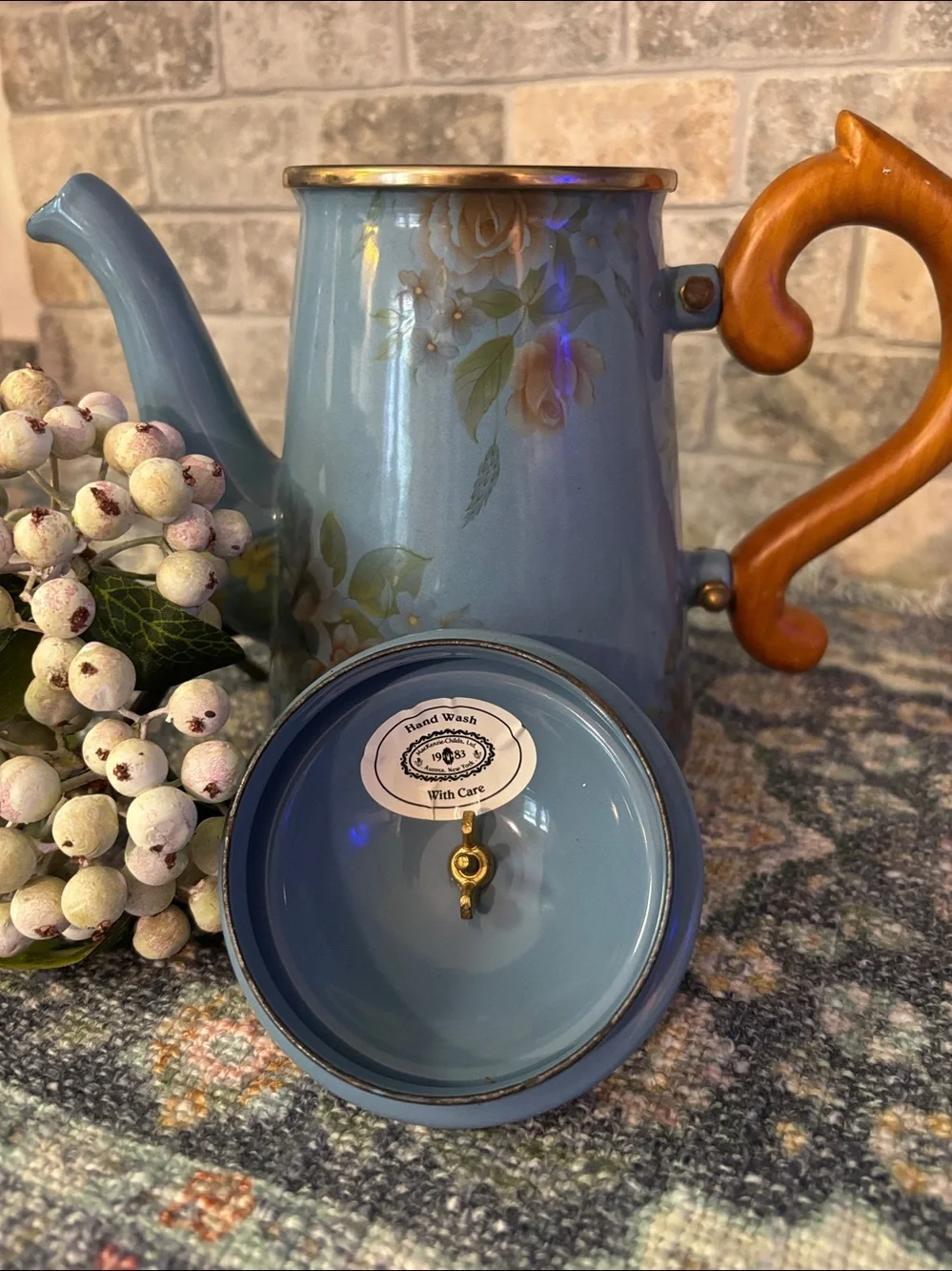 Camp Mackenzie-Childs enamel Blue Floral Teapot with decorative  wooden handle.